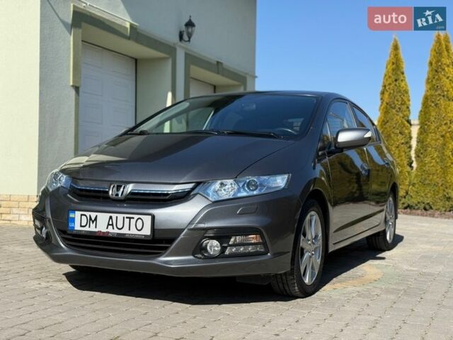 Серый Хонда Инсайт, объемом двигателя 1.3 л и пробегом 177 тыс. км за 10000 $, фото 24 на Automoto.ua