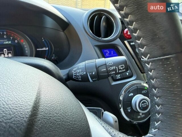 Серый Хонда Инсайт, объемом двигателя 1.3 л и пробегом 177 тыс. км за 10000 $, фото 68 на Automoto.ua