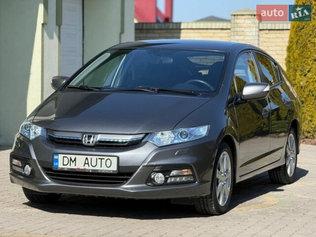 Серый Хонда Инсайт, объемом двигателя 1.3 л и пробегом 177 тыс. км за 10000 $, фото 18 на Automoto.ua