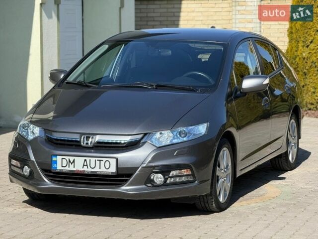 Серый Хонда Инсайт, объемом двигателя 1.3 л и пробегом 177 тыс. км за 10000 $, фото 19 на Automoto.ua