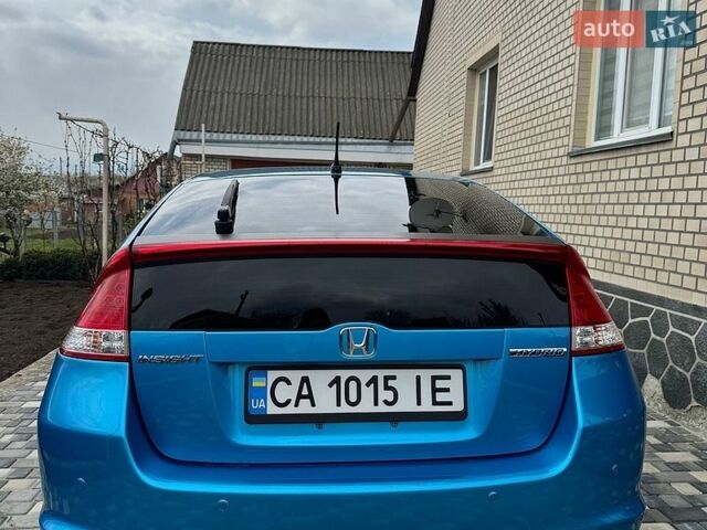 Синий Хонда Инсайт, объемом двигателя 1.34 л и пробегом 203 тыс. км за 6900 $, фото 4 на Automoto.ua