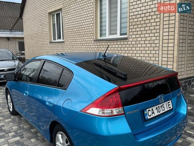 Синий Хонда Инсайт, объемом двигателя 1.34 л и пробегом 203 тыс. км за 6900 $, фото 2 на Automoto.ua