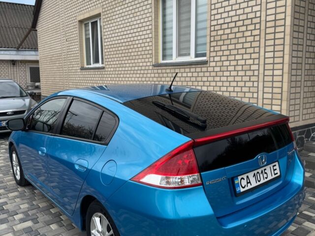 Синий Хонда Инсайт, объемом двигателя 1.3 л и пробегом 203 тыс. км за 7200 $, фото 2 на Automoto.ua