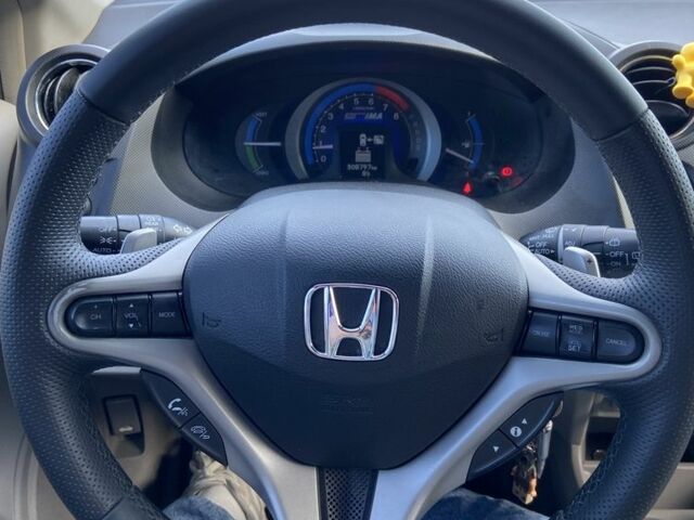 Синий Хонда Инсайт, объемом двигателя 1.3 л и пробегом 309 тыс. км за 7200 $, фото 5 на Automoto.ua