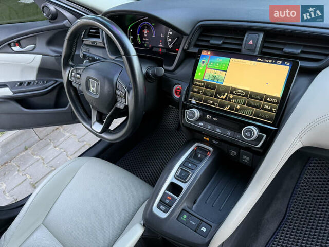 Синий Хонда Инсайт, объемом двигателя 1.5 л и пробегом 122 тыс. км за 15999 $, фото 95 на Automoto.ua