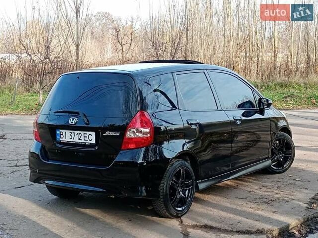 Черный Хонда Джаз, объемом двигателя 1.3 л и пробегом 157 тыс. км за 5999 $, фото 3 на Automoto.ua