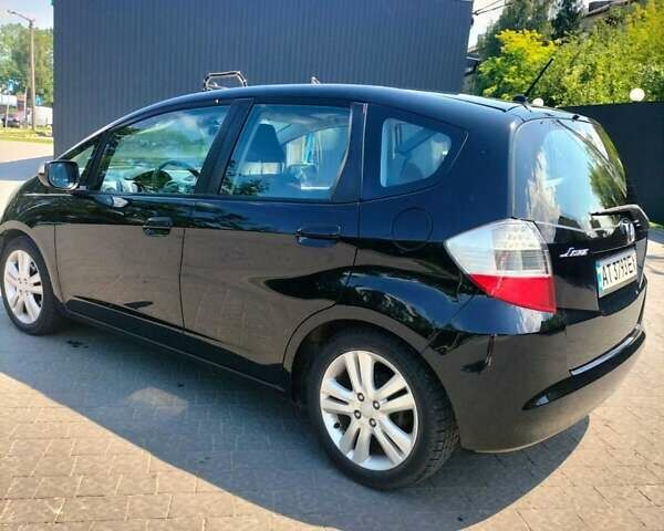 Черный Хонда Джаз, объемом двигателя 1.34 л и пробегом 241 тыс. км за 7104 $, фото 4 на Automoto.ua