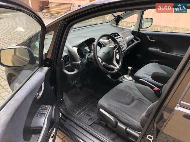 Черный Хонда Джаз, объемом двигателя 1.34 л и пробегом 230 тыс. км за 7150 $, фото 4 на Automoto.ua