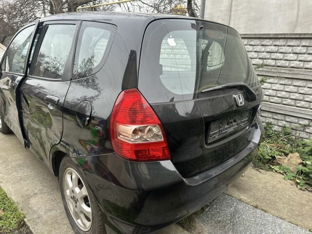 Черный Хонда Джаз, объемом двигателя 1.4 л и пробегом 200 тыс. км за 2600 $, фото 2 на Automoto.ua