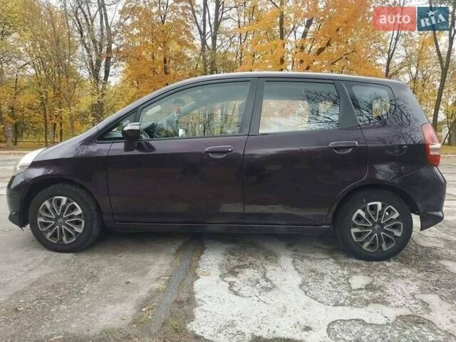 Фиолетовый Хонда Джаз, объемом двигателя 1.34 л и пробегом 264 тыс. км за 4700 $, фото 5 на Automoto.ua