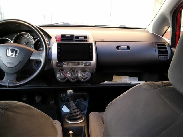 Красный Хонда Джаз, объемом двигателя 1.3 л и пробегом 295 тыс. км за 4555 $, фото 7 на Automoto.ua