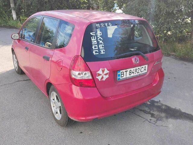 Красный Хонда Джаз, объемом двигателя 1.3 л и пробегом 295 тыс. км за 4555 $, фото 1 на Automoto.ua