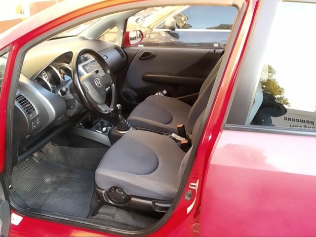 Красный Хонда Джаз, объемом двигателя 1.3 л и пробегом 295 тыс. км за 4555 $, фото 5 на Automoto.ua