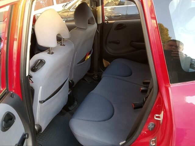 Красный Хонда Джаз, объемом двигателя 1.3 л и пробегом 295 тыс. км за 4555 $, фото 6 на Automoto.ua