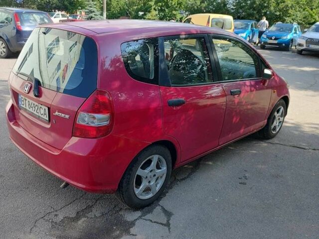 Красный Хонда Джаз, объемом двигателя 1.3 л и пробегом 295 тыс. км за 4555 $, фото 3 на Automoto.ua