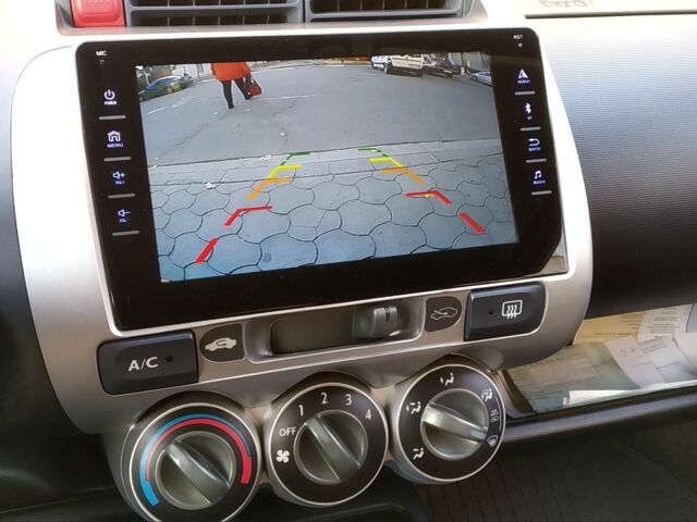 Красный Хонда Джаз, объемом двигателя 1.3 л и пробегом 295 тыс. км за 4555 $, фото 8 на Automoto.ua