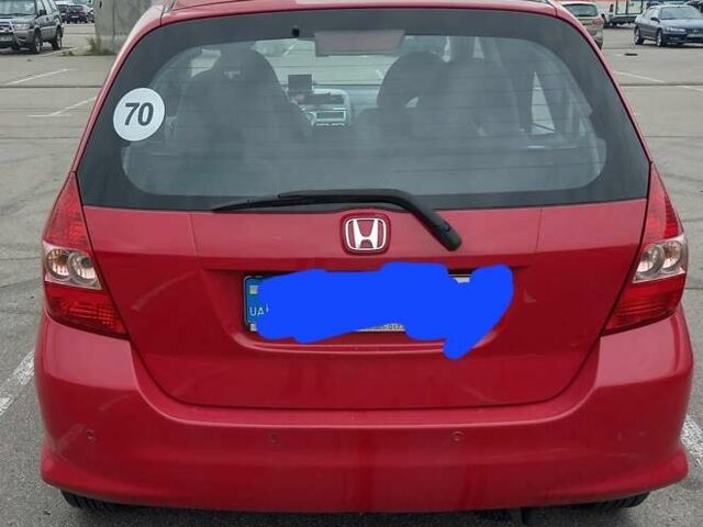 Красный Хонда Джаз, объемом двигателя 1.34 л и пробегом 190 тыс. км за 5500 $, фото 3 на Automoto.ua