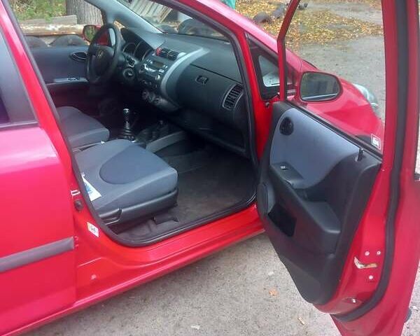 Красный Хонда Джаз, объемом двигателя 1.25 л и пробегом 200 тыс. км за 4000 $, фото 10 на Automoto.ua