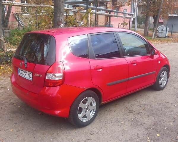 Красный Хонда Джаз, объемом двигателя 1.25 л и пробегом 200 тыс. км за 4000 $, фото 4 на Automoto.ua