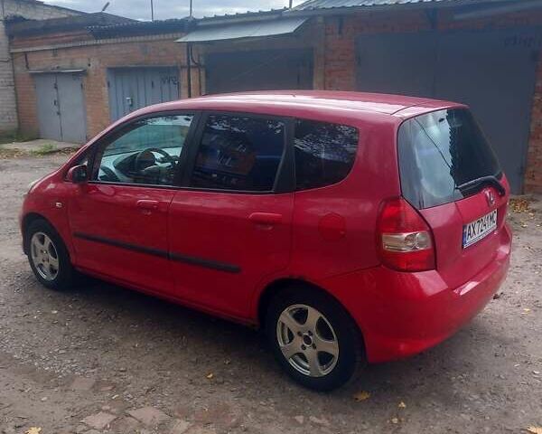 Красный Хонда Джаз, объемом двигателя 1.25 л и пробегом 200 тыс. км за 4000 $, фото 2 на Automoto.ua