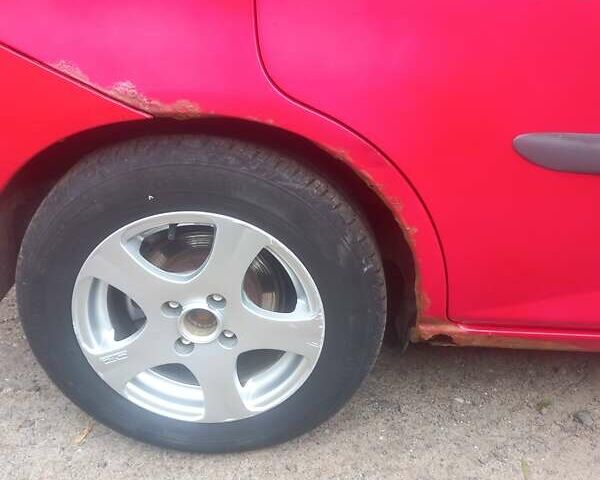 Красный Хонда Джаз, объемом двигателя 1.25 л и пробегом 200 тыс. км за 4000 $, фото 12 на Automoto.ua