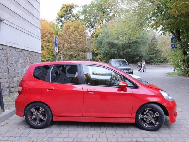 Красный Хонда Джаз, объемом двигателя 1.3 л и пробегом 137 тыс. км за 4700 $, фото 2 на Automoto.ua