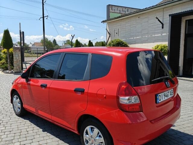 Красный Хонда Джаз, объемом двигателя 1.2 л и пробегом 184 тыс. км за 5000 $, фото 4 на Automoto.ua