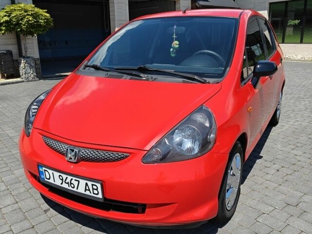 Красный Хонда Джаз, объемом двигателя 1.2 л и пробегом 184 тыс. км за 5000 $, фото 1 на Automoto.ua