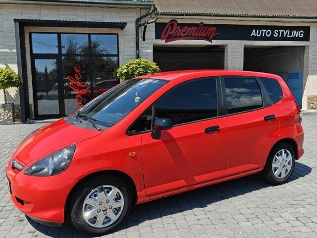 Красный Хонда Джаз, объемом двигателя 1.2 л и пробегом 184 тыс. км за 5000 $, фото 2 на Automoto.ua