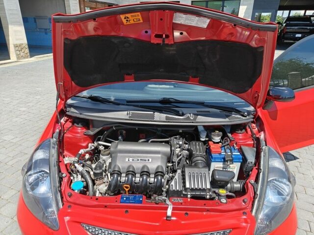 Красный Хонда Джаз, объемом двигателя 1.2 л и пробегом 184 тыс. км за 5000 $, фото 21 на Automoto.ua