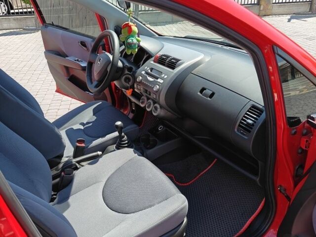 Красный Хонда Джаз, объемом двигателя 1.2 л и пробегом 184 тыс. км за 5000 $, фото 17 на Automoto.ua