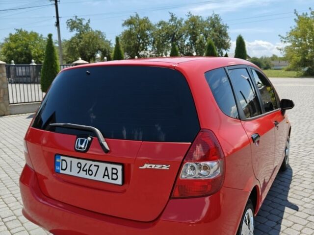 Красный Хонда Джаз, объемом двигателя 1.2 л и пробегом 184 тыс. км за 5000 $, фото 6 на Automoto.ua
