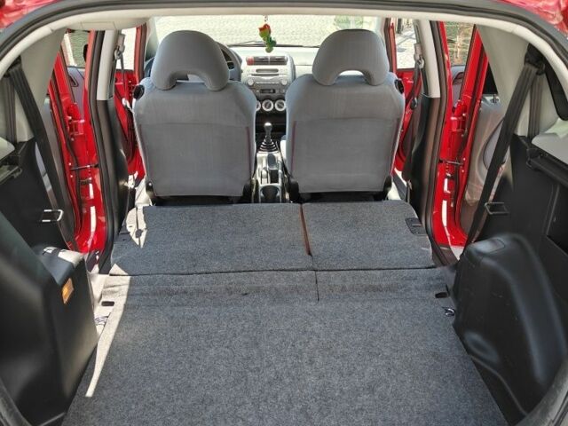 Красный Хонда Джаз, объемом двигателя 1.2 л и пробегом 184 тыс. км за 5000 $, фото 16 на Automoto.ua