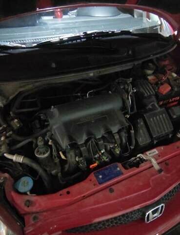 Хонда Джаз 2007 в Никополе на Automoto.ua Красный Хонда Джаз, объемом двигателя 1.34 л и пробегом 128 тыс. км за 5650 $, фото 9 на Automoto.ua