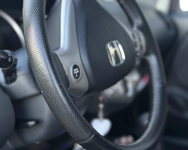 Красный Хонда Джаз, объемом двигателя 1.34 л и пробегом 90 тыс. км за 7300 $, фото 8 на Automoto.ua