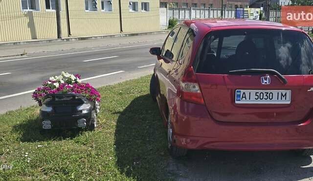 Красный Хонда Джаз, объемом двигателя 1.34 л и пробегом 210 тыс. км за 6200 $, фото 13 на Automoto.ua
