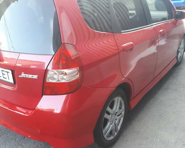 Красный Хонда Джаз, объемом двигателя 1.34 л и пробегом 158 тыс. км за 6200 $, фото 6 на Automoto.ua