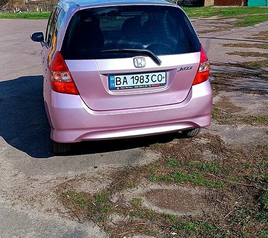 Красный Хонда Джаз, объемом двигателя 1.3 л и пробегом 122 тыс. км за 6500 $, фото 2 на Automoto.ua