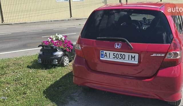 Красный Хонда Джаз, объемом двигателя 1.34 л и пробегом 210 тыс. км за 6200 $, фото 16 на Automoto.ua