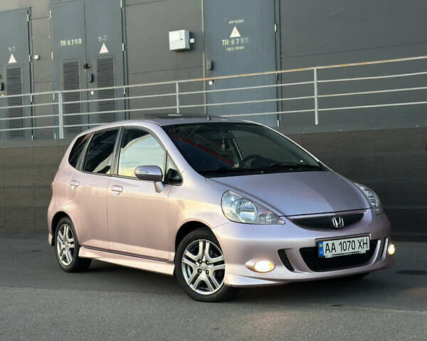 Красный Хонда Джаз, объемом двигателя 1.34 л и пробегом 90 тыс. км за 7300 $, фото 1 на Automoto.ua