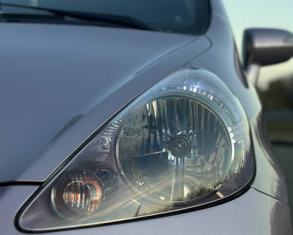 Красный Хонда Джаз, объемом двигателя 1.34 л и пробегом 90 тыс. км за 7300 $, фото 5 на Automoto.ua