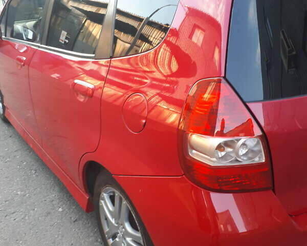 Красный Хонда Джаз, объемом двигателя 1.34 л и пробегом 158 тыс. км за 6200 $, фото 1 на Automoto.ua