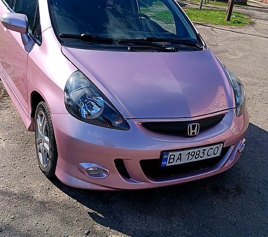 Красный Хонда Джаз, объемом двигателя 1.3 л и пробегом 122 тыс. км за 6500 $, фото 1 на Automoto.ua