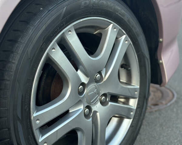 Красный Хонда Джаз, объемом двигателя 1.34 л и пробегом 90 тыс. км за 7300 $, фото 6 на Automoto.ua