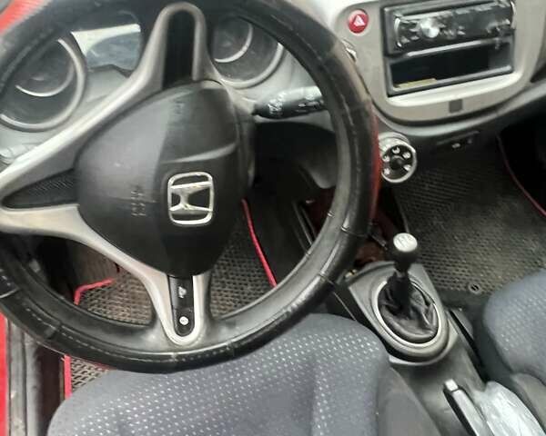 Красный Хонда Джаз, объемом двигателя 1.2 л и пробегом 218 тыс. км за 4500 $, фото 8 на Automoto.ua