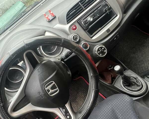 Красный Хонда Джаз, объемом двигателя 1.2 л и пробегом 218 тыс. км за 4500 $, фото 9 на Automoto.ua