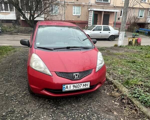 Красный Хонда Джаз, объемом двигателя 1.2 л и пробегом 218 тыс. км за 4500 $, фото 1 на Automoto.ua