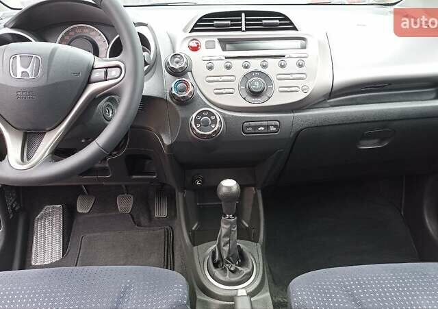 Красный Хонда Джаз, объемом двигателя 1.2 л и пробегом 146 тыс. км за 6800 $, фото 9 на Automoto.ua