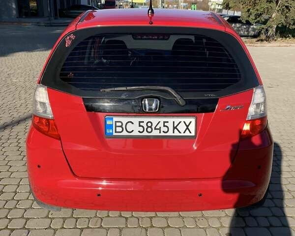 Червоний Хонда Джаз, об'ємом двигуна 1.34 л та пробігом 162 тис. км за 5750 $, фото 1 на Automoto.ua