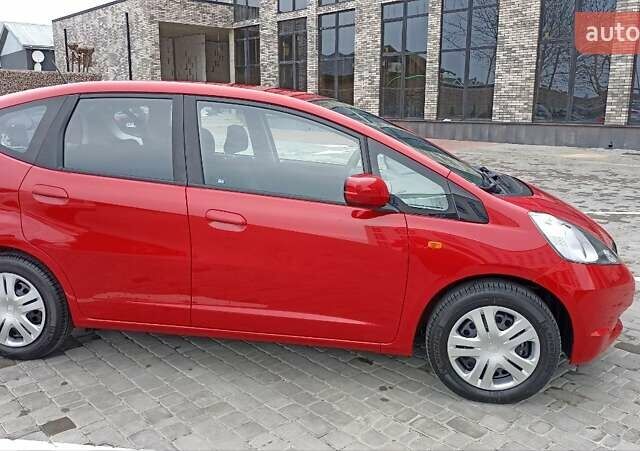 Красный Хонда Джаз, объемом двигателя 1.2 л и пробегом 146 тыс. км за 6800 $, фото 3 на Automoto.ua